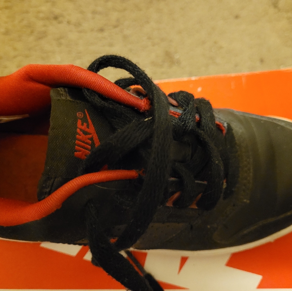 Nike black white and red. I wore them two times